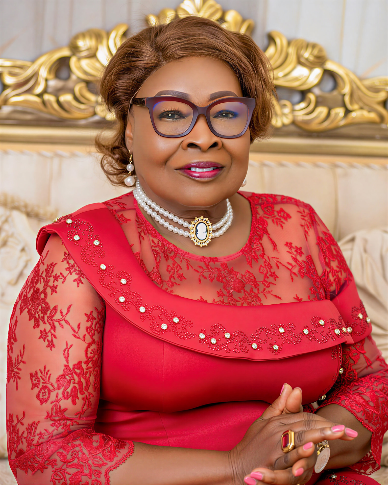 Formal seated portrait of Her Excellency Kartumu Yarta Boakai, founding visionary of Helping Hand Liberia.